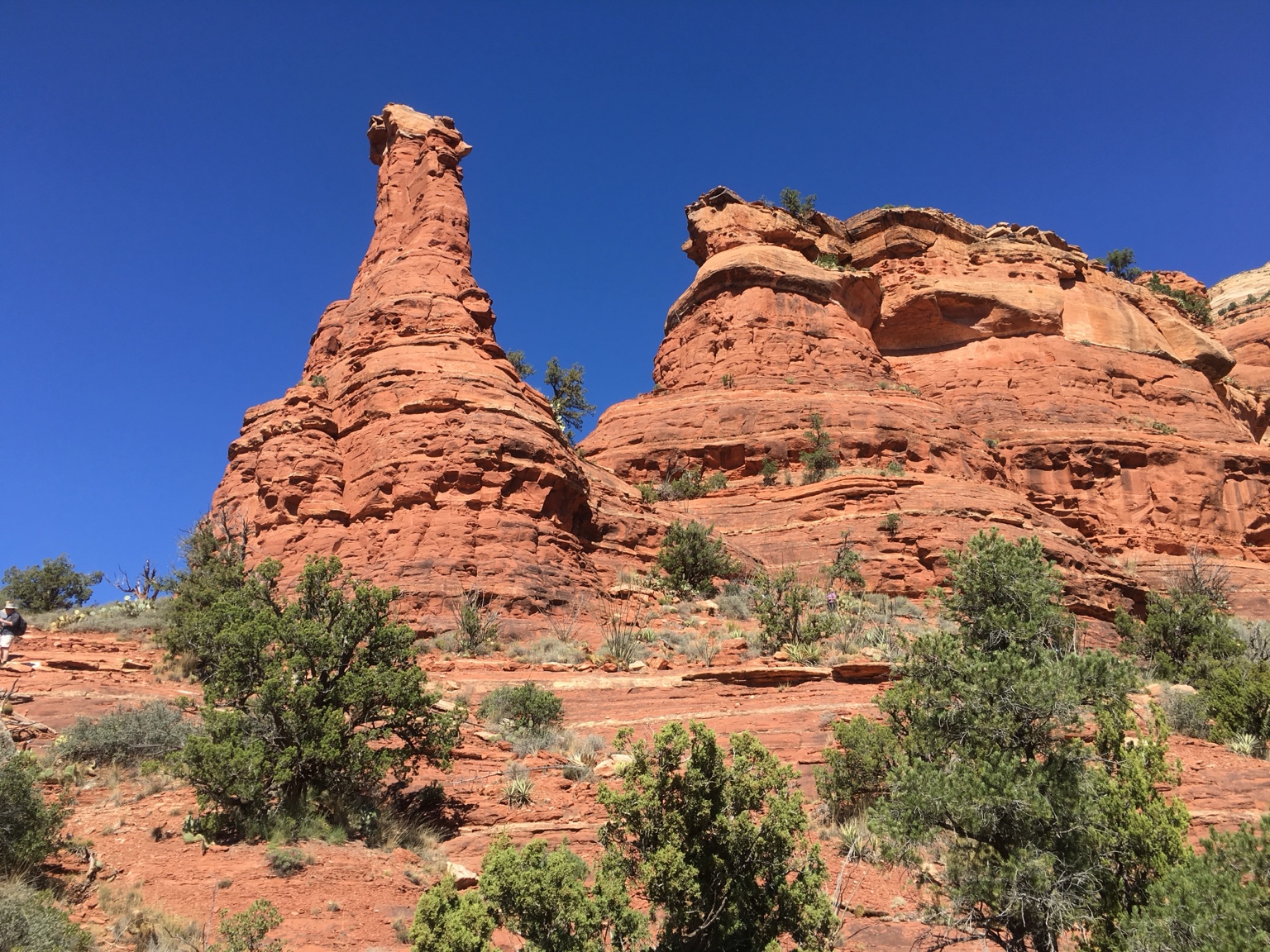 Red rock formations under a blue sky